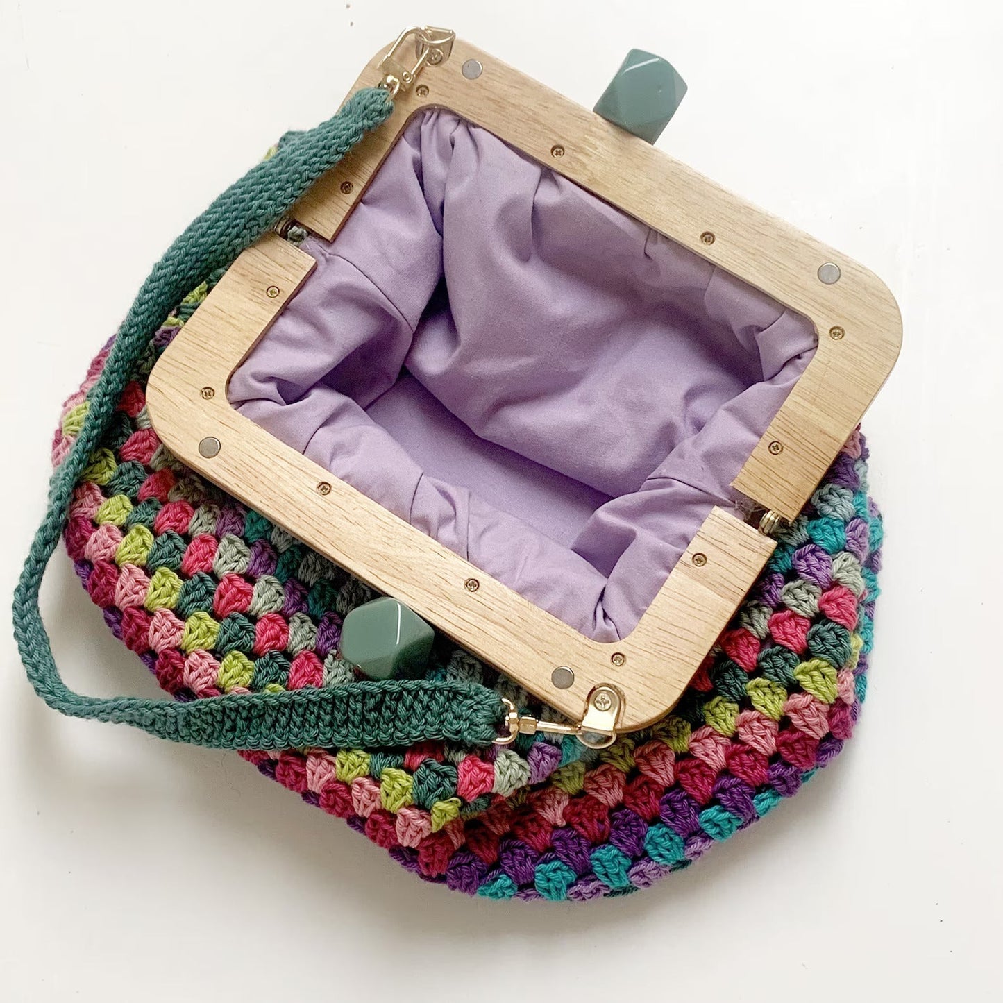 Shaped Granny rows clutch bag crochet pattern